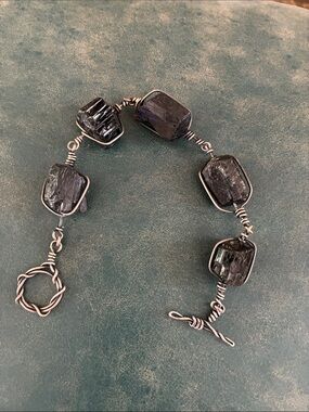 Morgan Dane Black tourmaline. Sterling silver toggle clasp. Fits 6-7 1/2” wrist